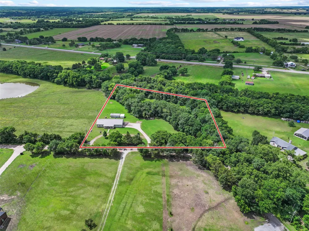1673 County Road 1525 Ector, TX 75439