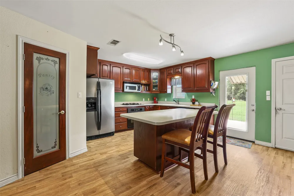 1673 County Road 1525 Ector, TX 75439