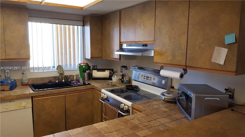 201 NW 7th St #408 Miami, FL 33136