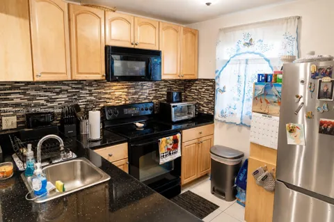 12014 S Greenway Cir S #105