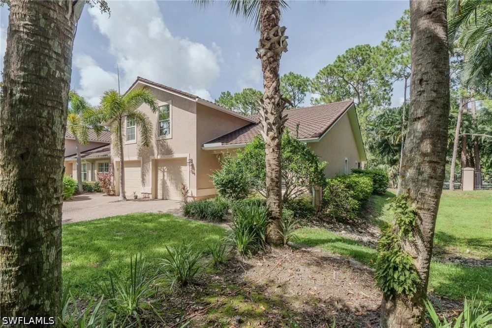 AVION WOODS COURT #104 Naples, FL 34104