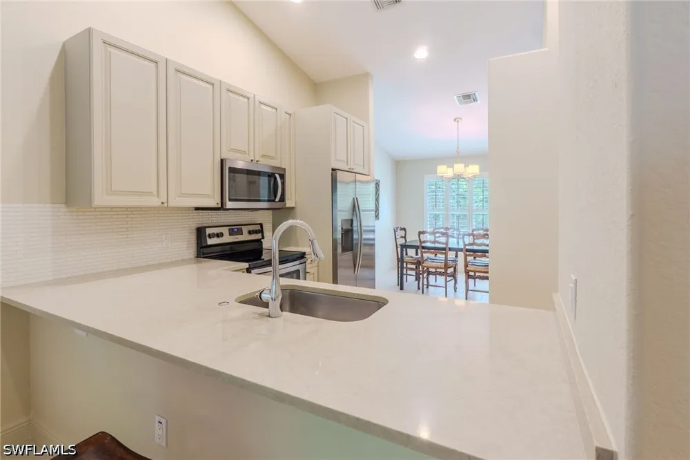AVION WOODS COURT #104 Naples, FL 34104