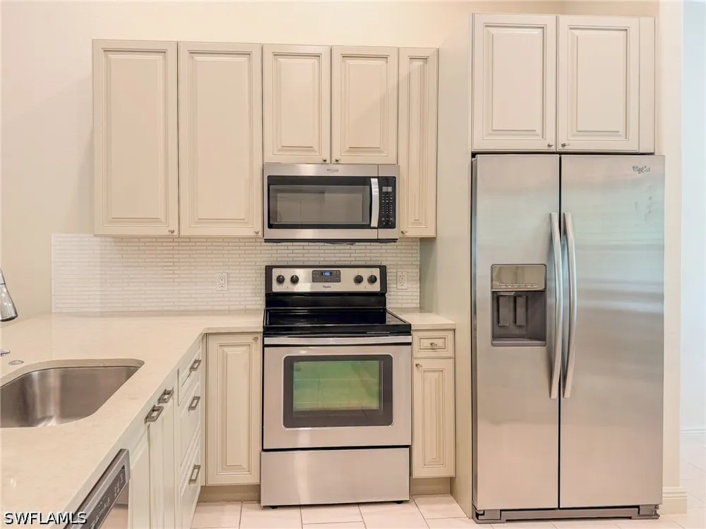 AVION WOODS COURT #104 Naples, FL 34104