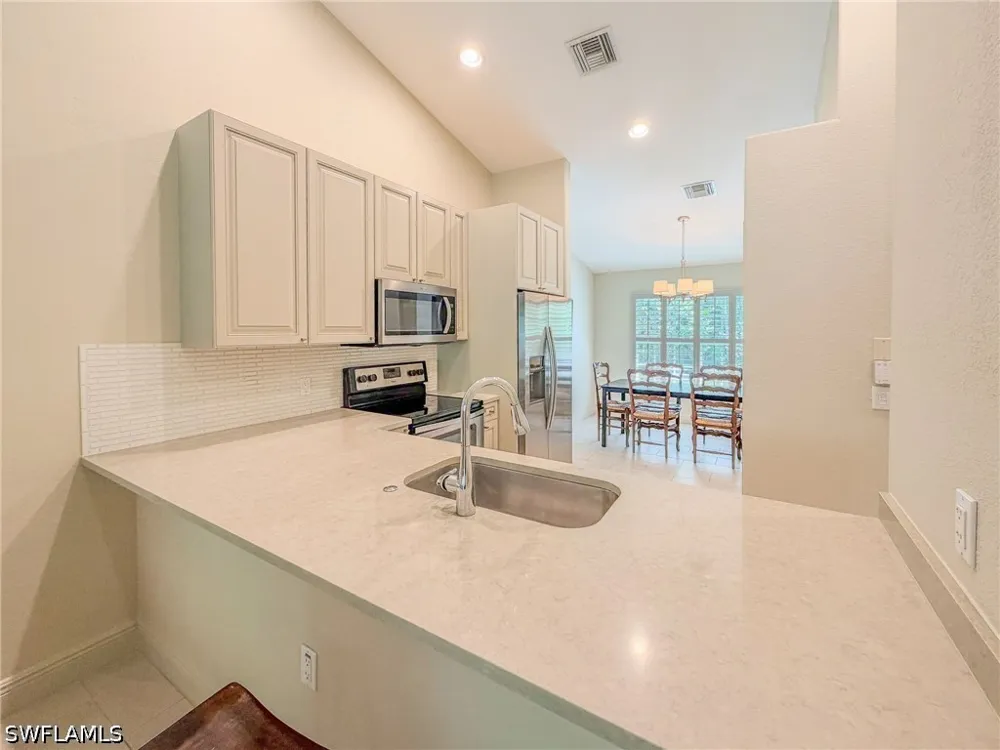 AVION WOODS COURT #104 Naples, FL 34104
