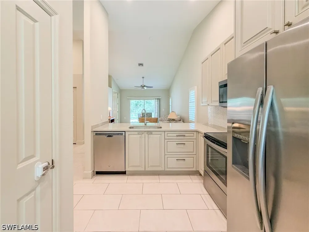 AVION WOODS COURT #104 Naples, FL 34104