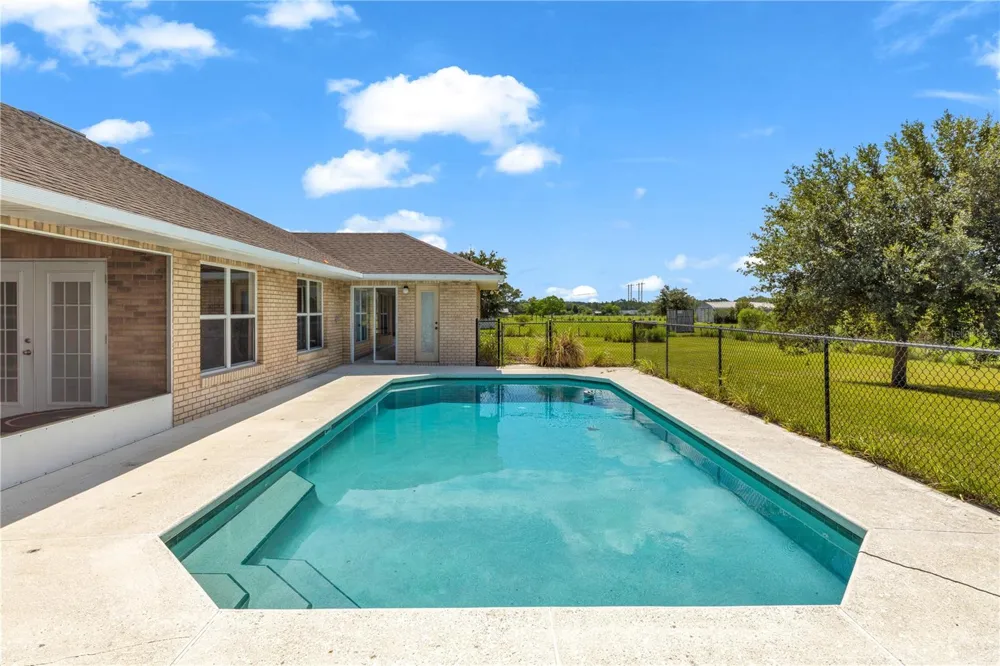 1005 WHISPRING CREEK WAY Osteen, FL 32764