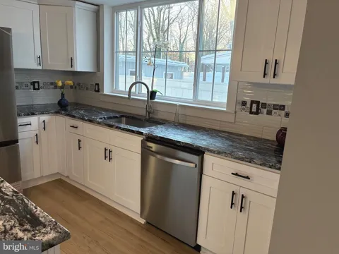 80 E 3RD STREET