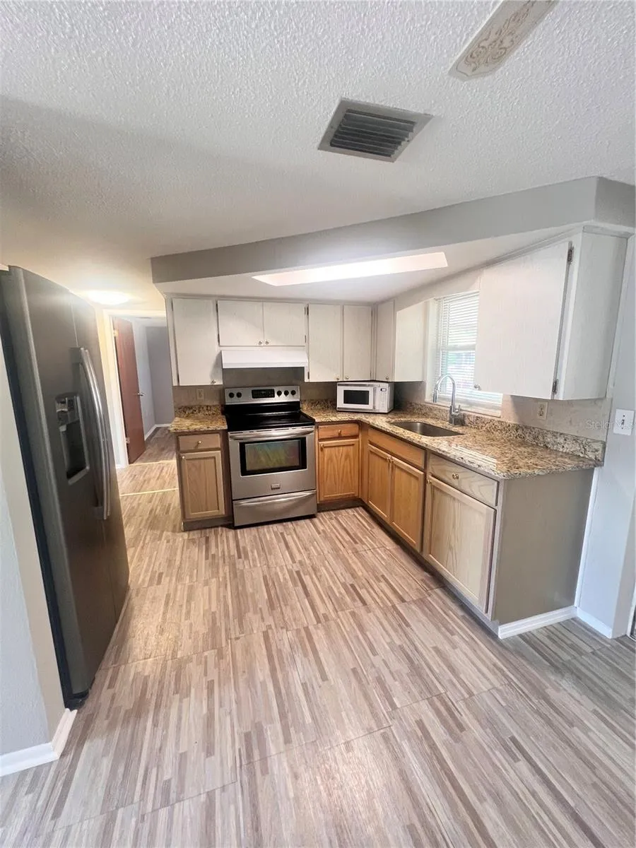 9910 LAKE CHRISE LANE Port Richey, FL 34668