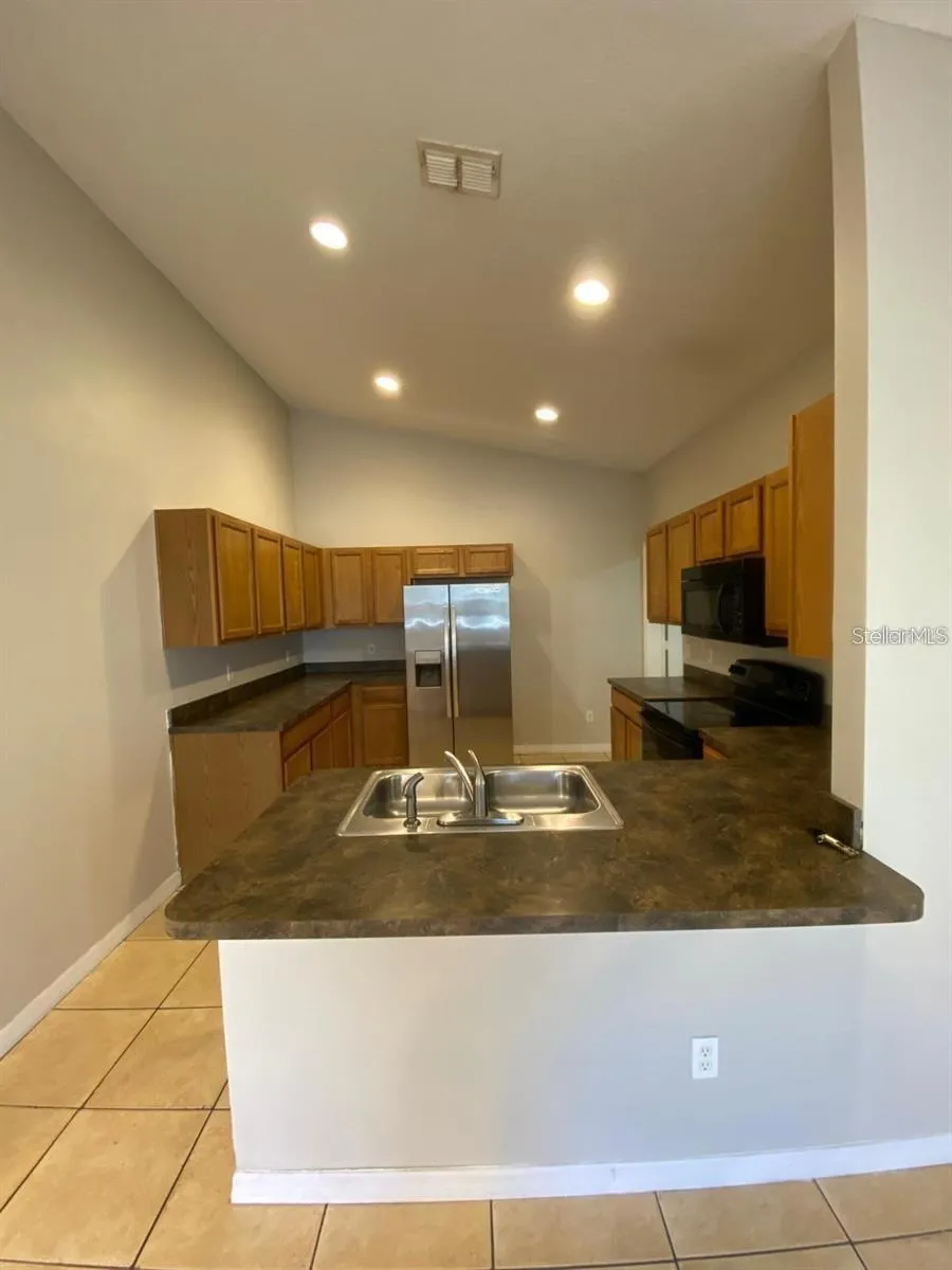 502 BLACKBIRD LANE #A Poinciana, FL 34759