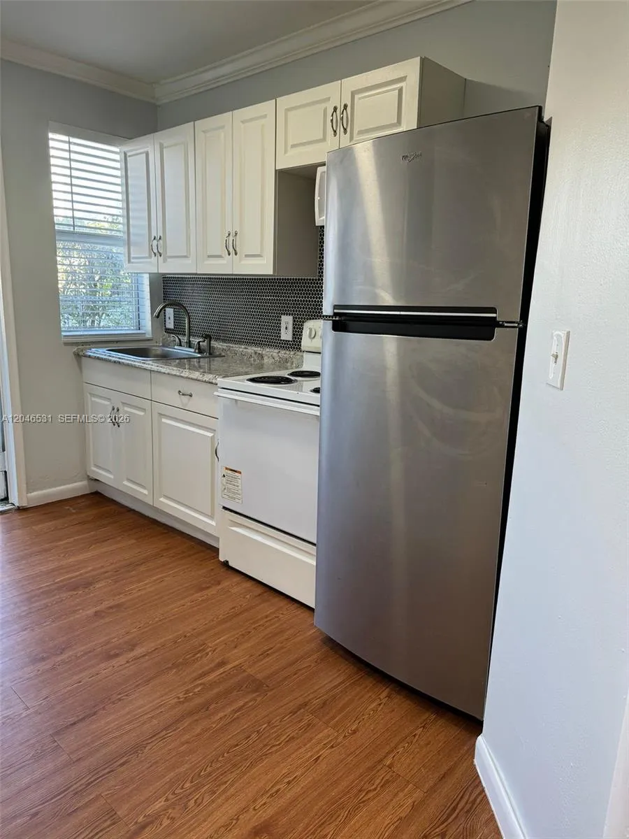 103 NW 6th Ave #2 Miami, FL 33128