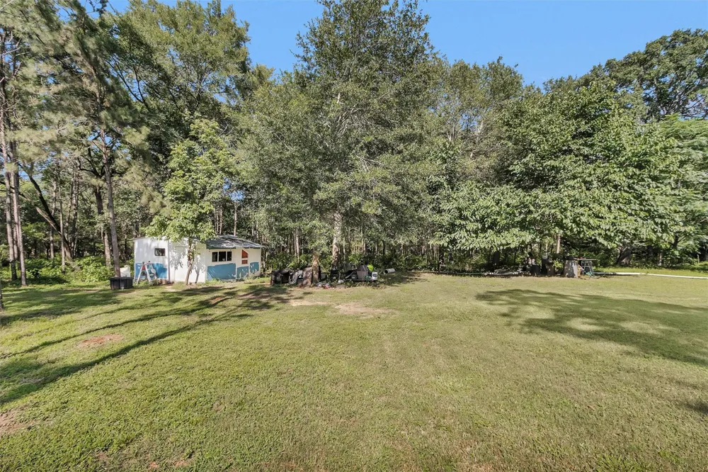 6493 Planters Row Lane Plantersville, TX 77363