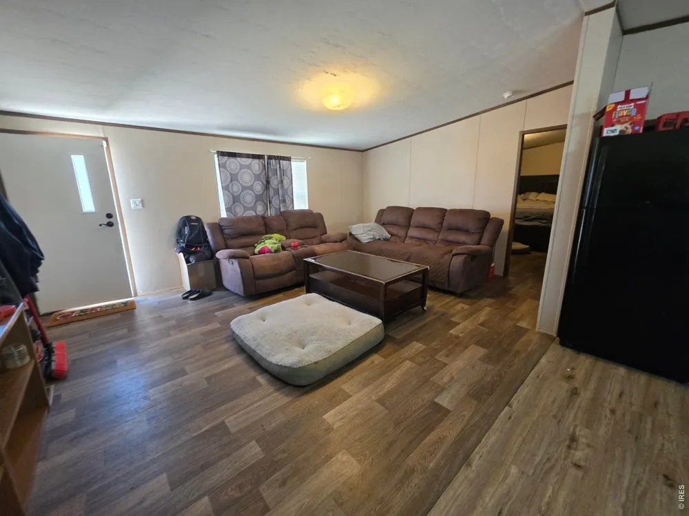209 Larch Drive Log Lane Village, CO 80705