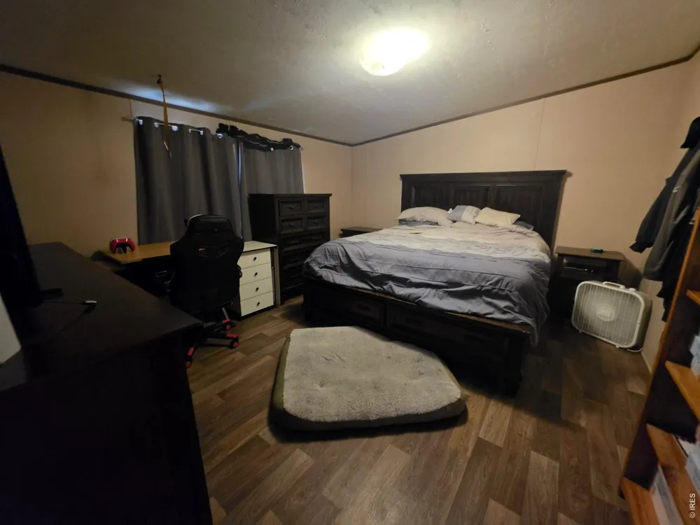 209 Larch Drive Log Lane Village, CO 80705