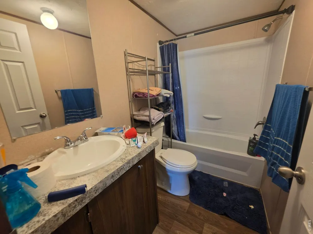 209 Larch Drive Log Lane Village, CO 80705