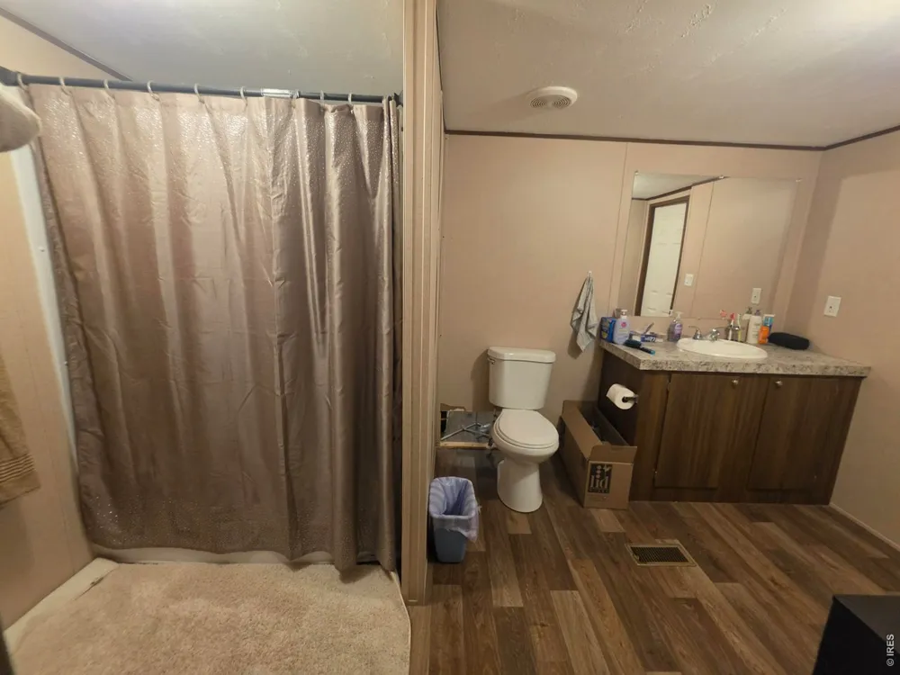 209 Larch Drive Log Lane Village, CO 80705