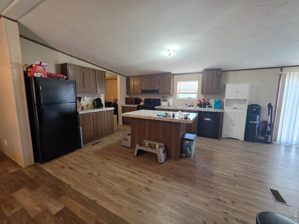 209 Larch Drive Log Lane Village, CO 80705
