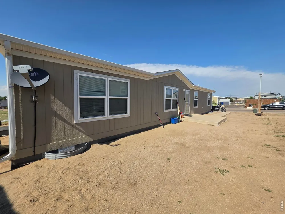 209 Larch Drive Log Lane Village, CO 80705