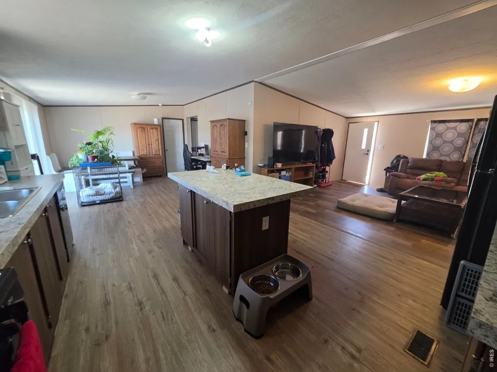 209 Larch Drive Log Lane Village, CO 80705