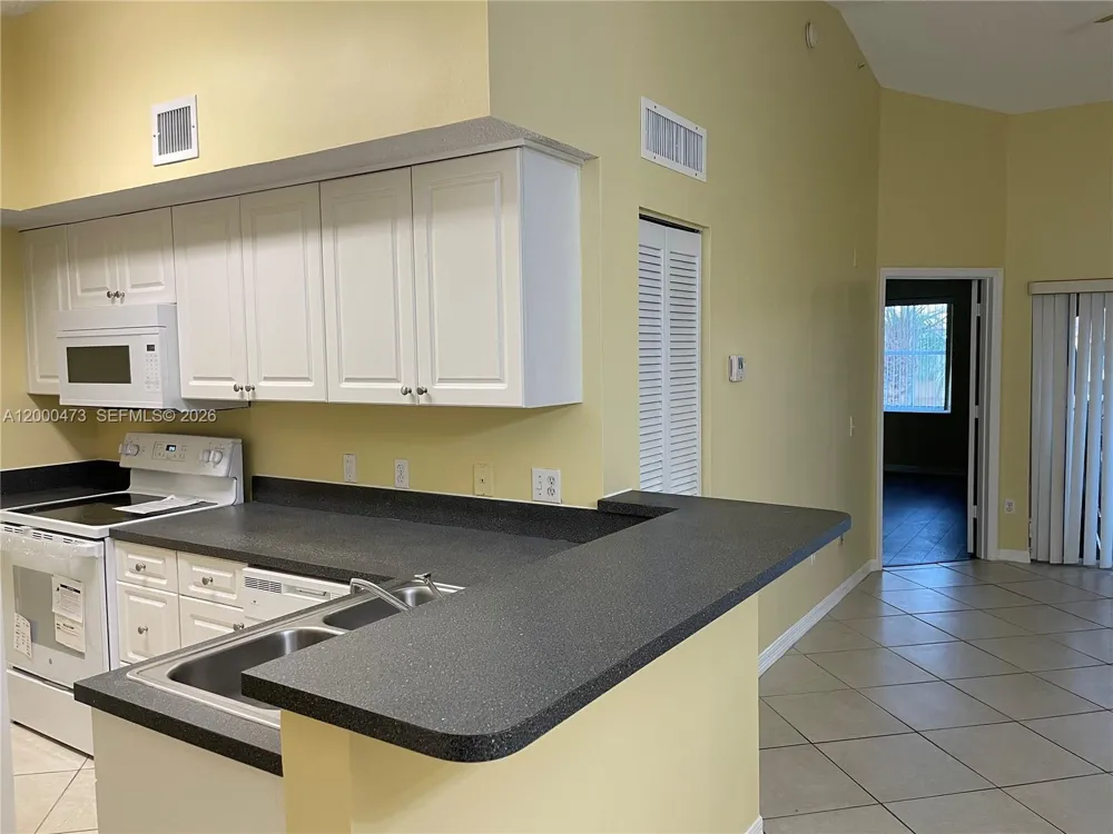 9645 NW 1st Ct #1-303 Pembroke Pines, FL 33024