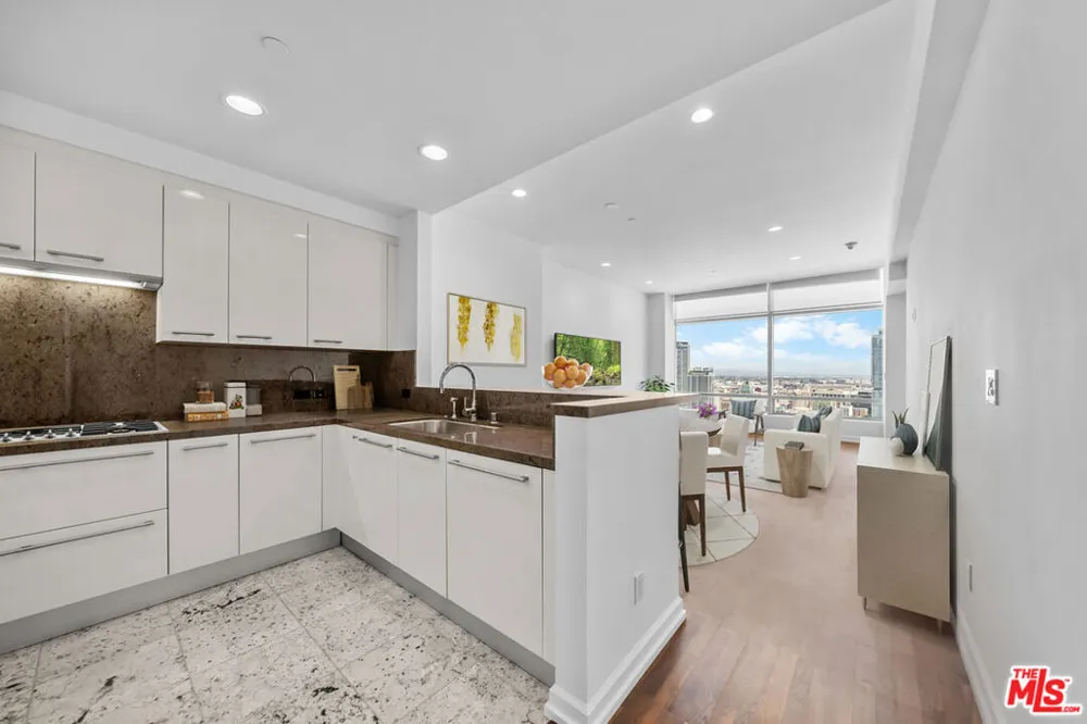 900 W OLYMPIC BOULEVARD #31E Los Angeles, CA 90015