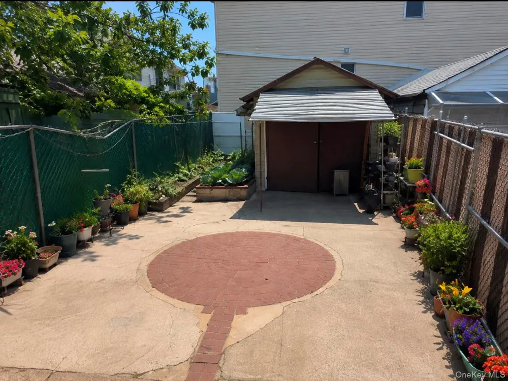 77-06 97th Avenue Ozone Park, NY 11416