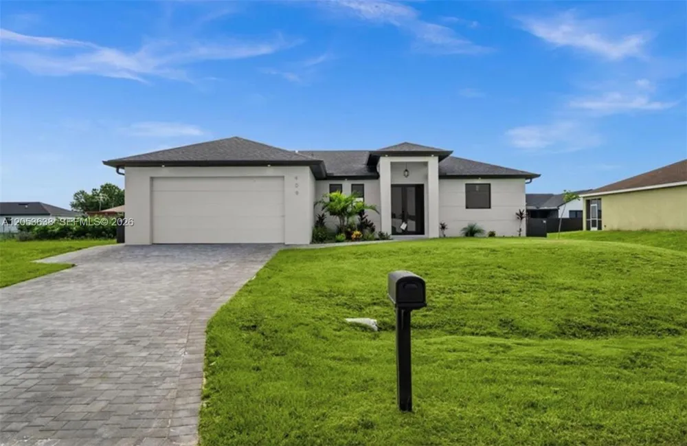 409 NW 25th PL Cape Coral, FL 33993
