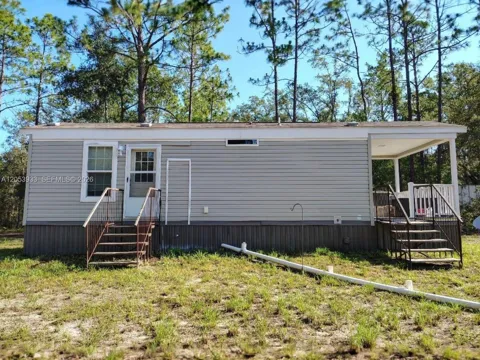 5840 NW 11TH AVE
