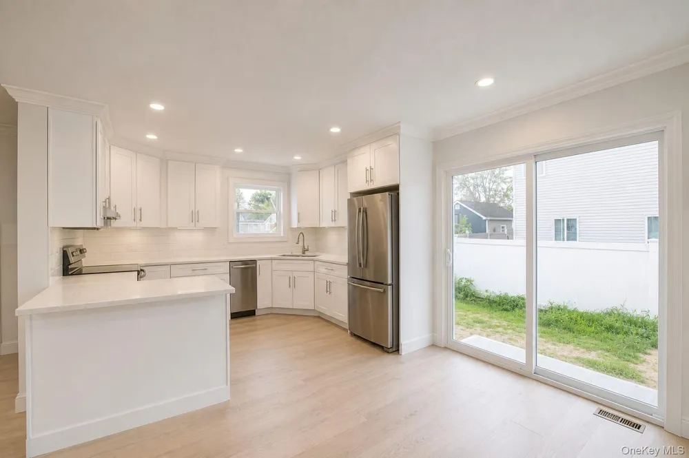 1316 R STREET Elmont, NY 11003
