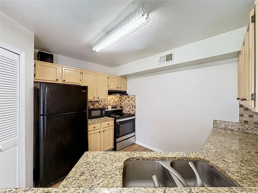 4817 NORMANDY PLACE #105 Orlando, FL 32811