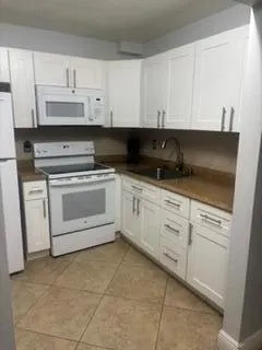 600 VILLAGE GREEN COURT #220 Palm Springs, FL 33461