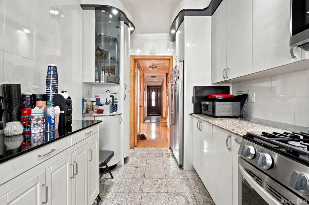 99-57 65th Road Rego Park, NY 11374