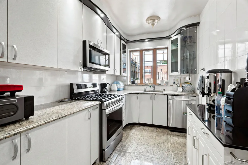 99-57 65th Road Rego Park, NY 11374