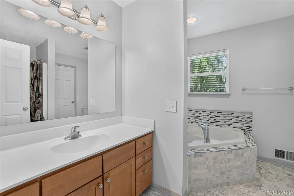 5677 Cartago Drive Delhi Charter Township, MI 48911