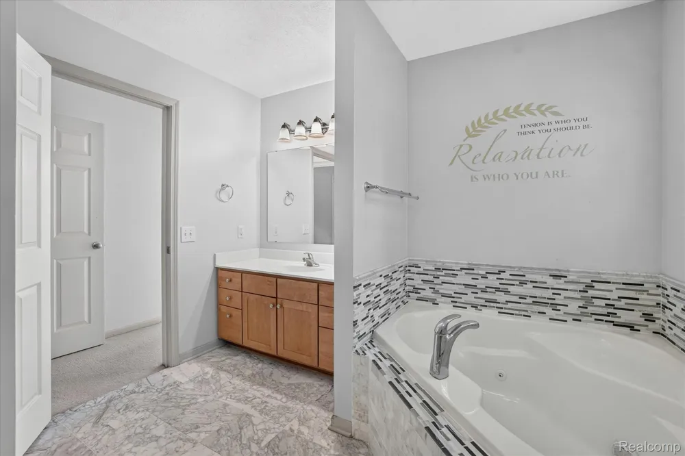 5677 Cartago Drive Delhi Charter Township, MI 48911