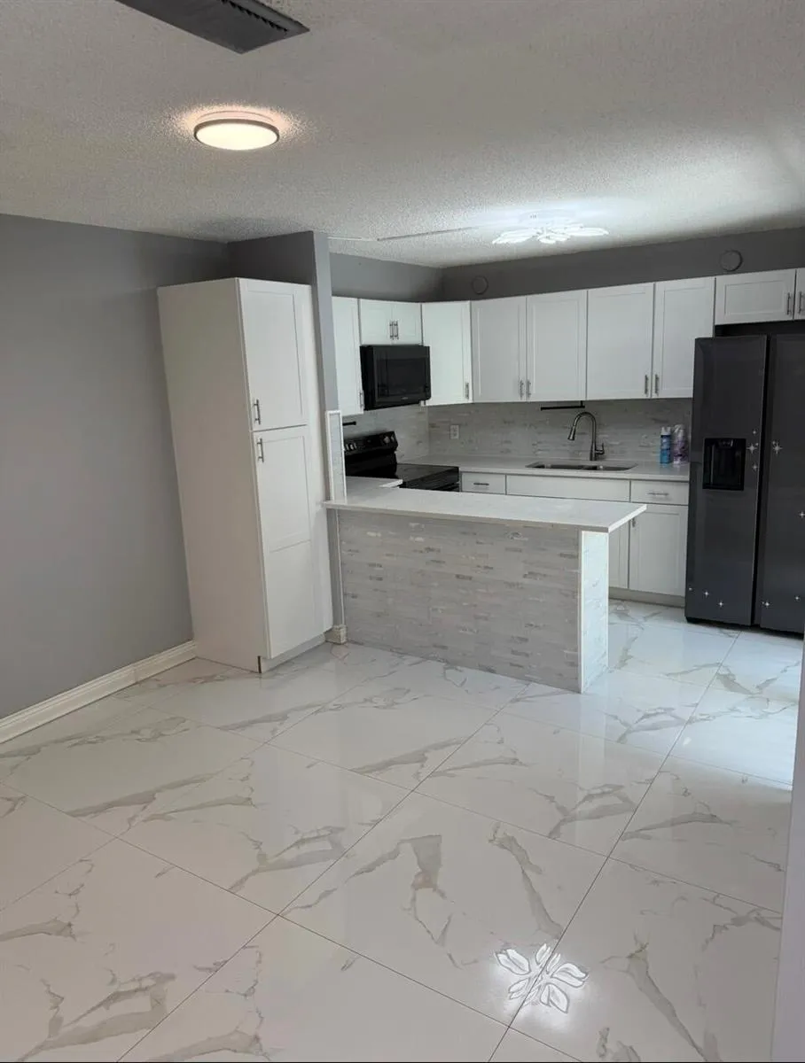232 WOODLAND ROAD Palm Springs, FL 33461