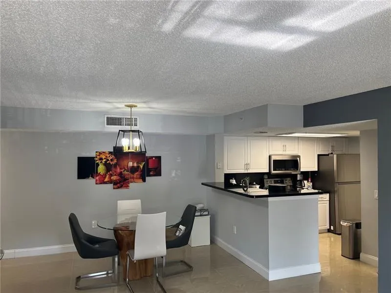 5051 WILES ROAD #207 Coconut Creek, FL 33073