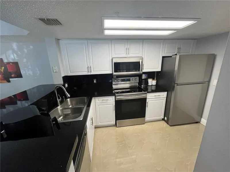 5051 WILES ROAD #207 Coconut Creek, FL 33073