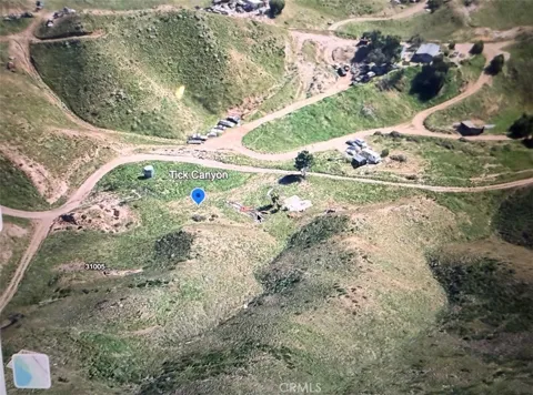 Tick Canyon Road, approximately ½ mile south