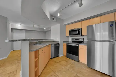 3638 NW MEDITERRANEAN LANE #208