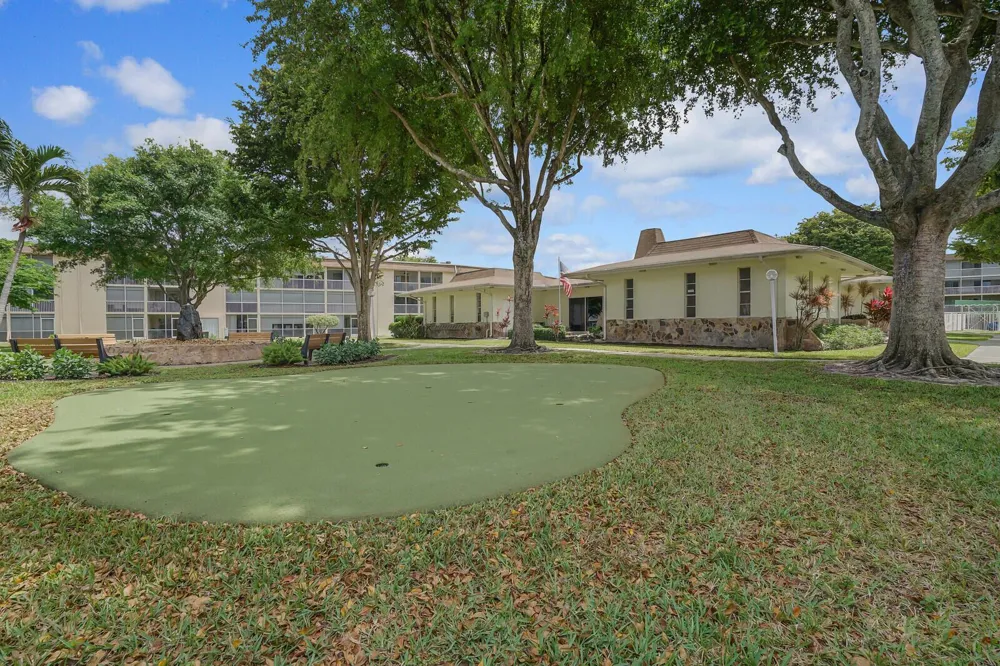 400 VILLAGE GREEN CIRCLE W #105 Palm Springs, FL 33461