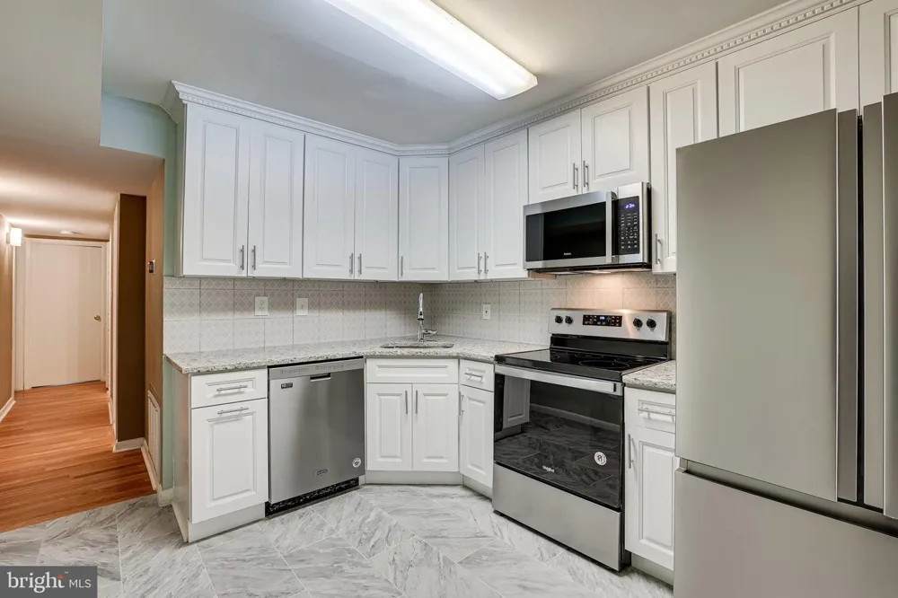 2210 SPRINGWOOD DRIVE #207 Reston, VA 20191