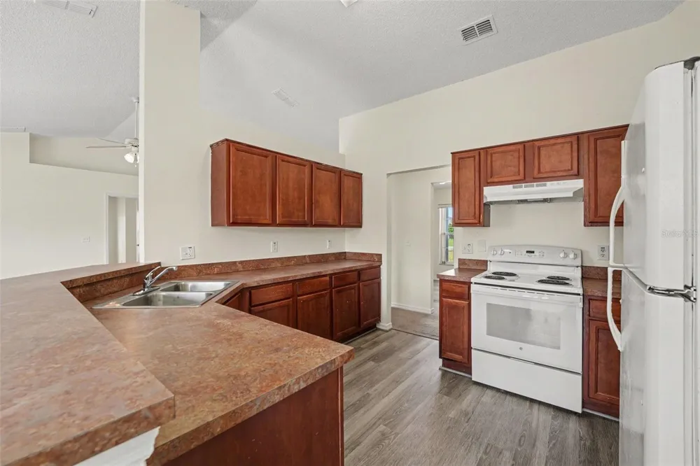 1714 PILCHARD DRIVE Poinciana, FL 34759