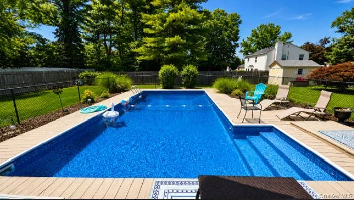 9 Singingwood Drive Stony Brook, NY 11790