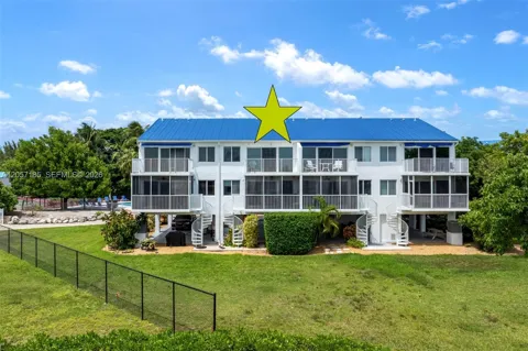 95 Coco Plum Dr Unit 4B & Slip B-34