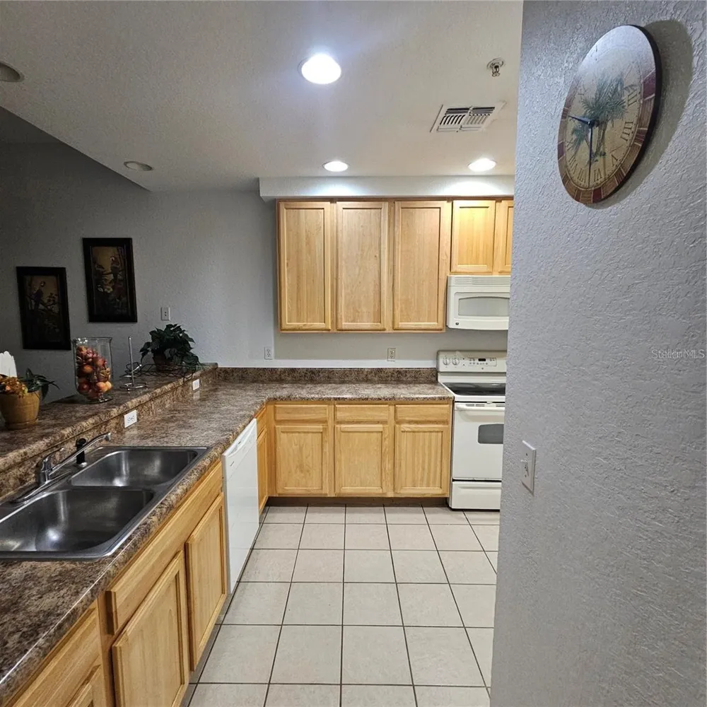 9055 TREASURE TROVE LANE #201 Kissimmee, FL 34747