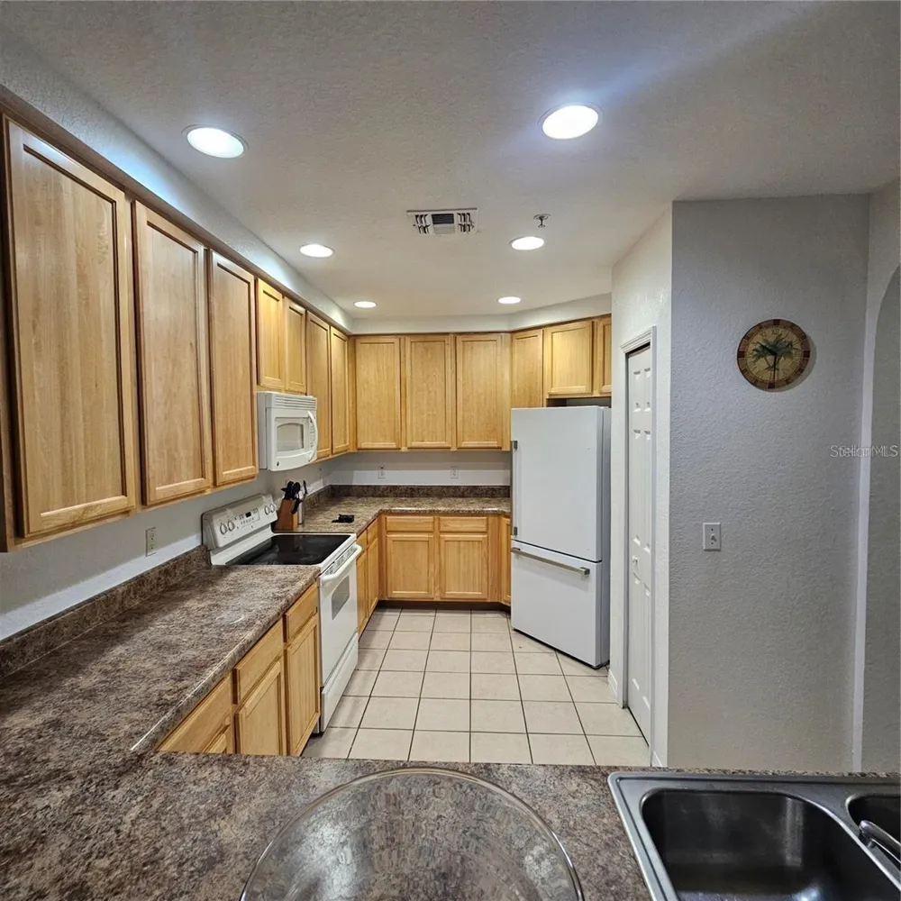 9055 TREASURE TROVE LANE #201 Kissimmee, FL 34747
