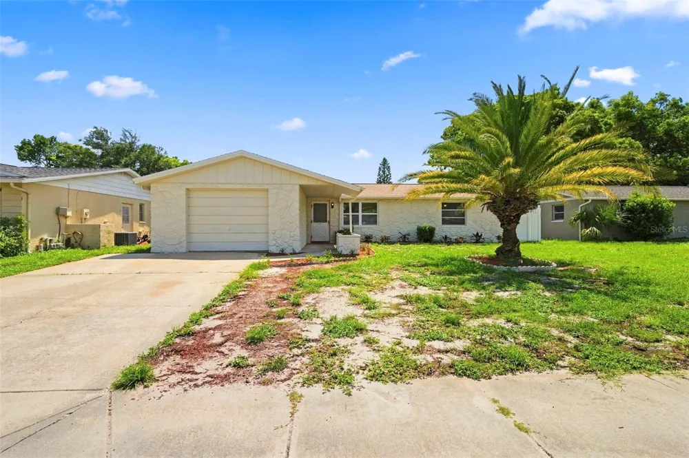 8936 WINDSONG LANE Port Richey, FL 34668