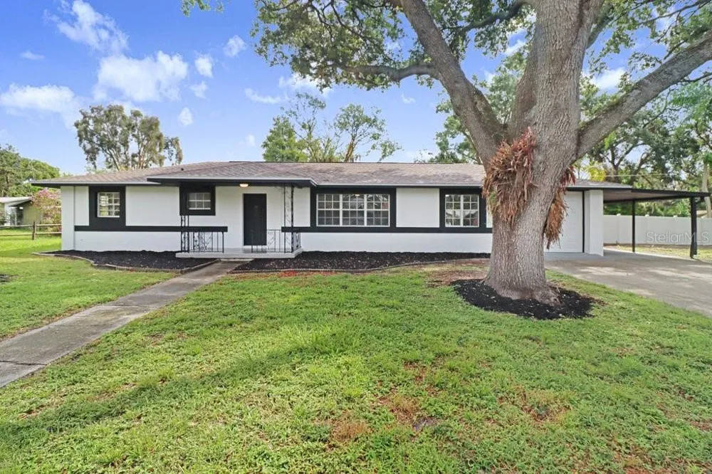 12113 MIDLAKE DRIVE Tampa, FL 33612