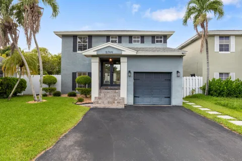 5799 WOODLAND POINT DRIVE