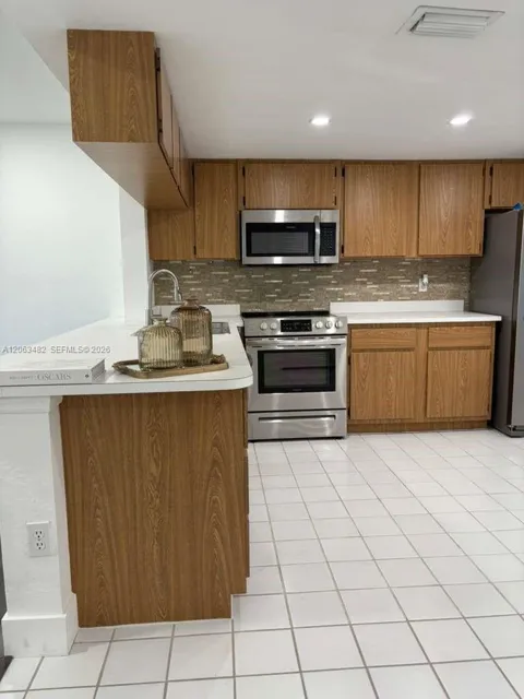 1005 Palm Beach Trace Dr #1005